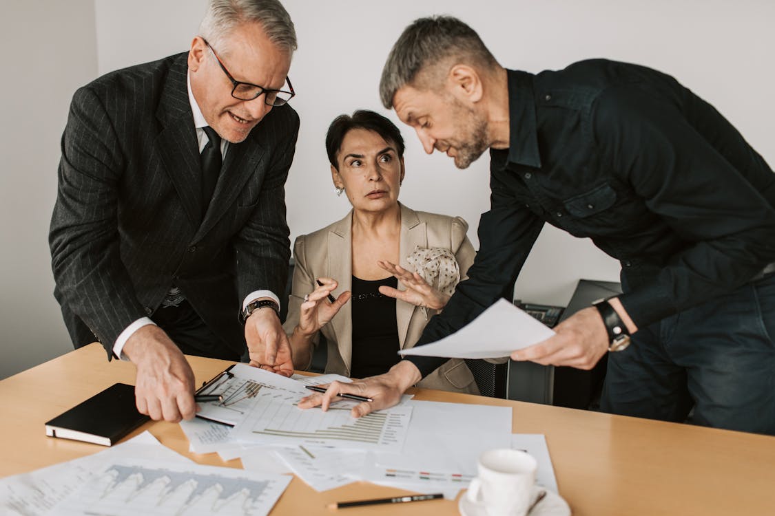 Business team discussing IT outsourcing decision