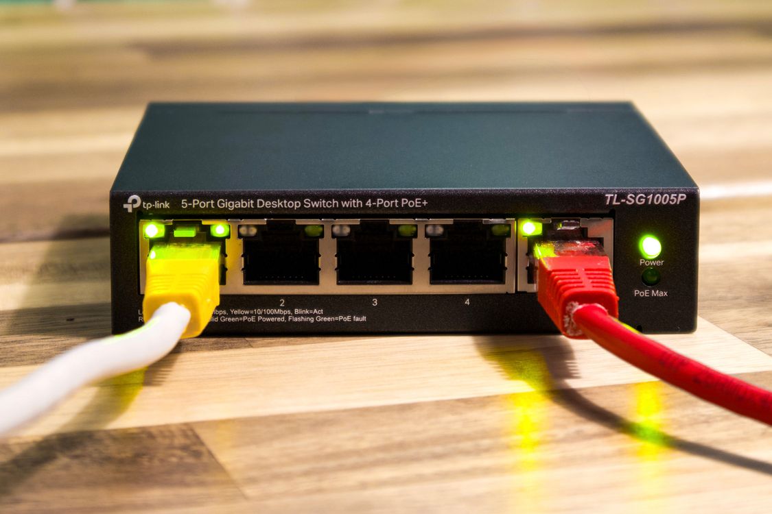 Ethernet switch with connected network cables for small business Wi-Fi security
