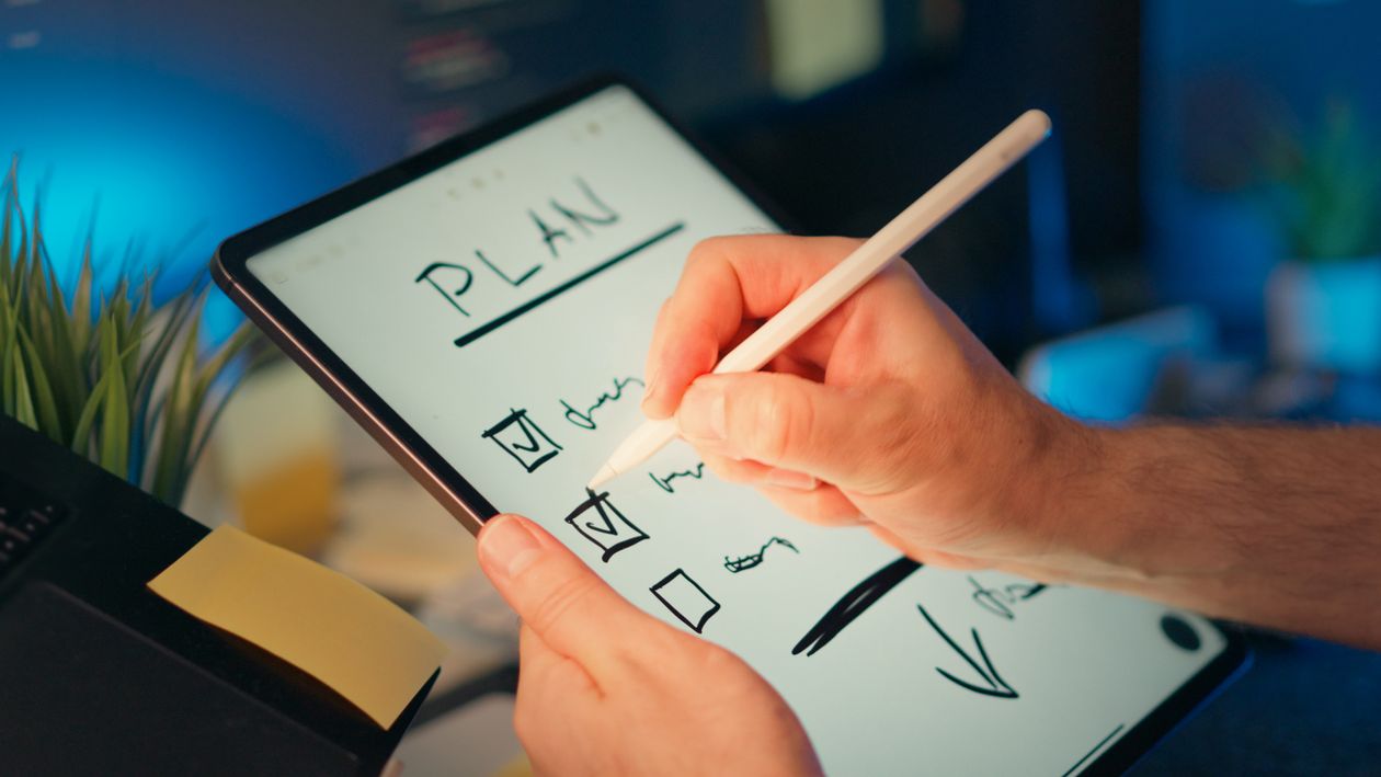 Digital planning on tablet with stylus pen representing business technology roadmap